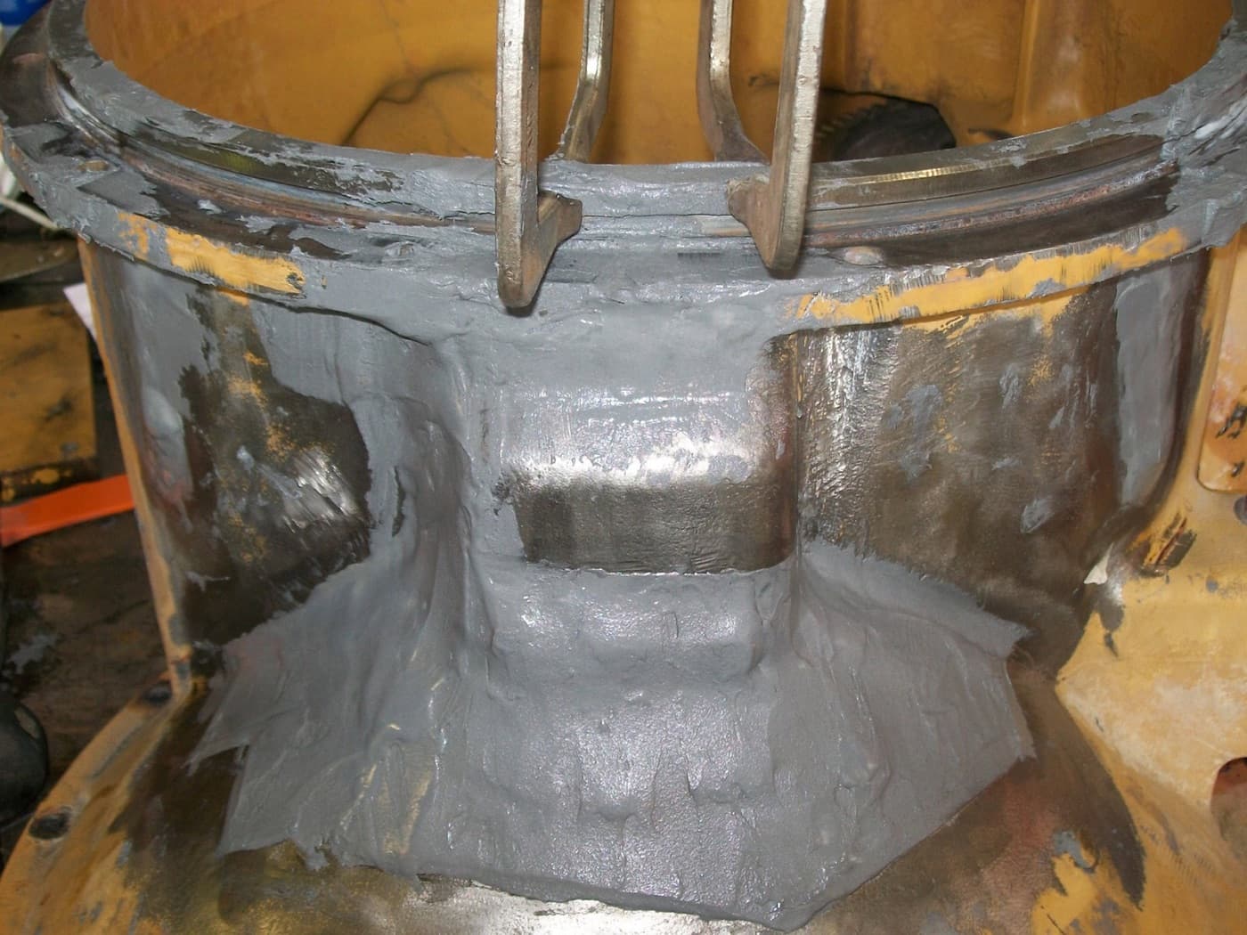 Lost wall thickness rebuilt with a cold-applied composite before wrapping