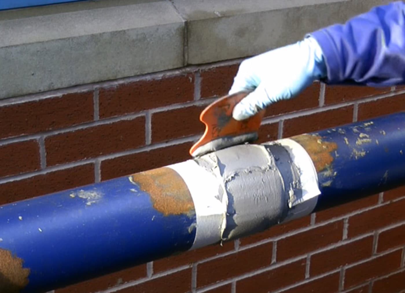 Transformer radiator bank with weeping oil leak sealed and coated
