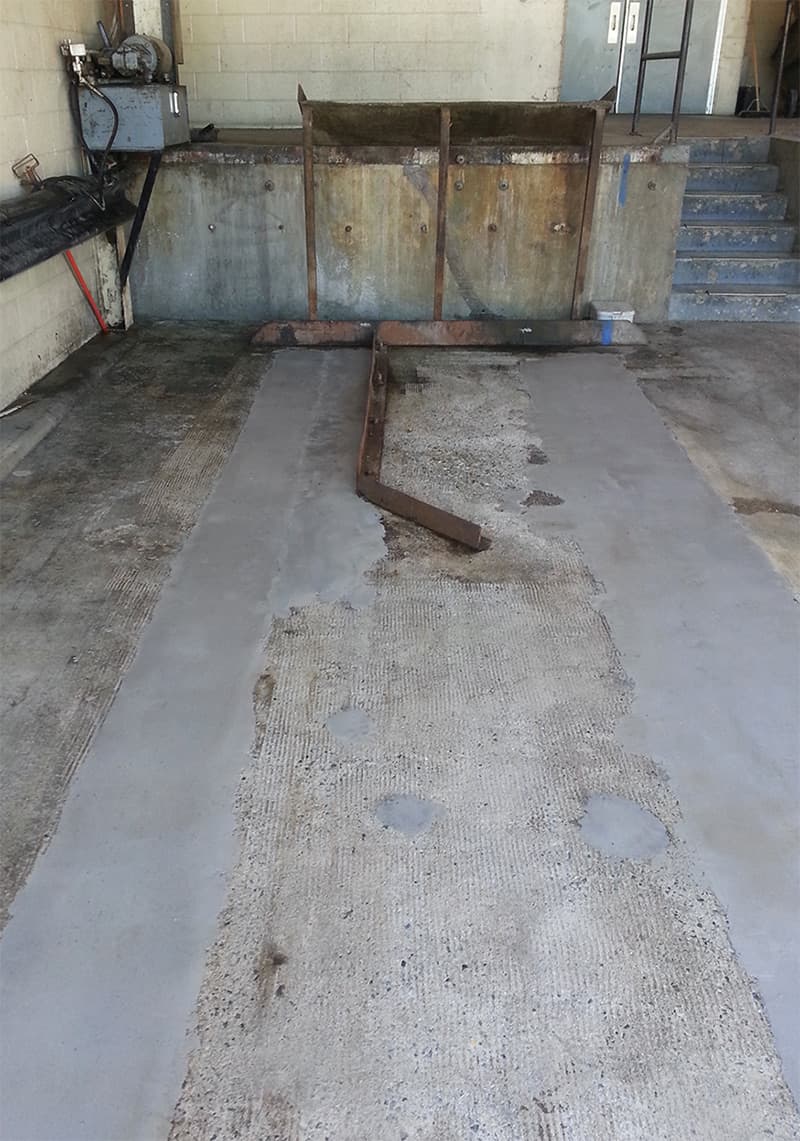 Deteriorated concrete of an unloading area repaired with Belzona 4154 and overcoated with Belzona 4131
