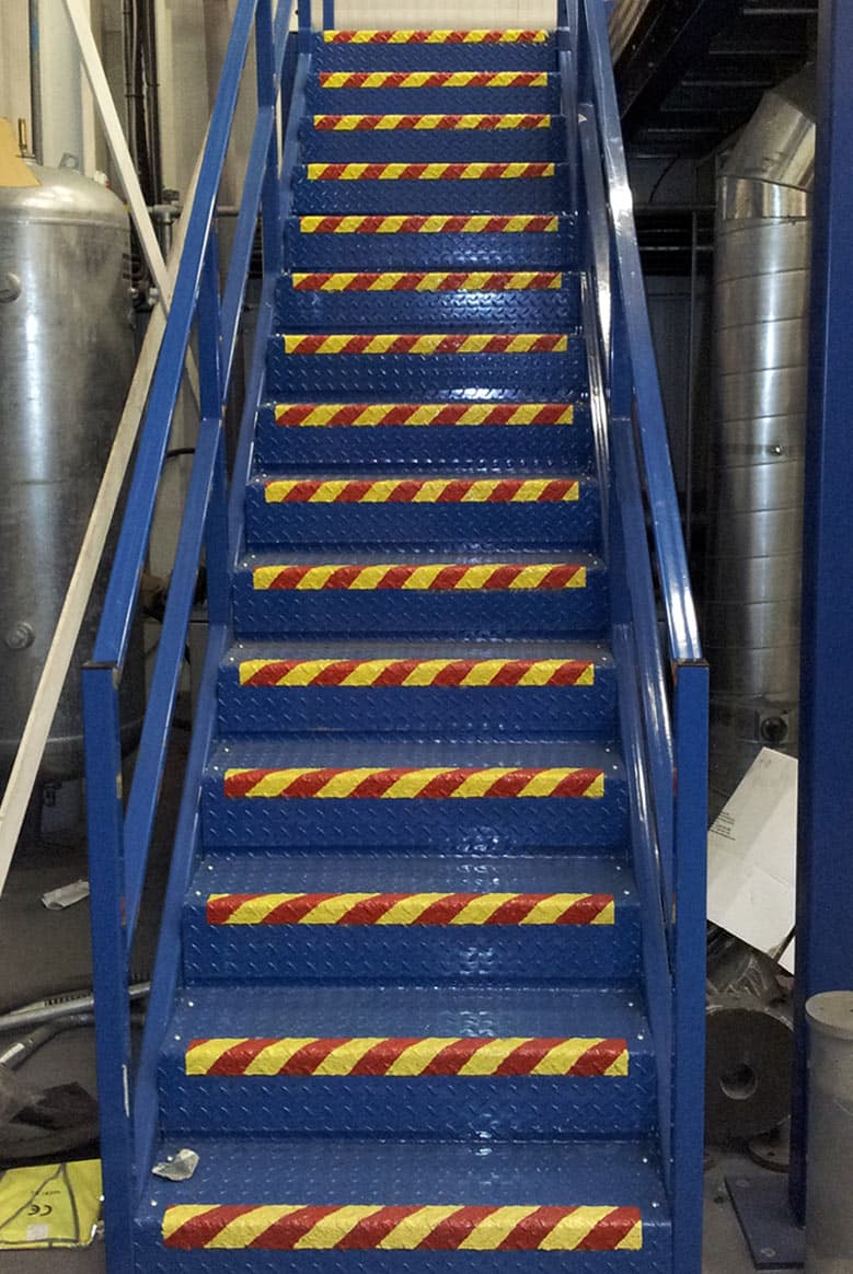 Belzona 4411 (Granogrip) in red and safety yellow highlighting the hazard