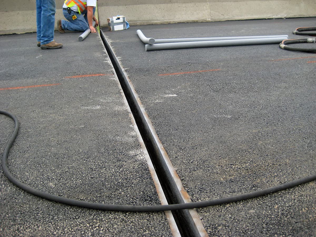 Damaged expansion joint on road section